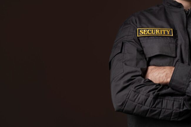 portrait-male-security-guard-with-uniform How much does a security guard cost